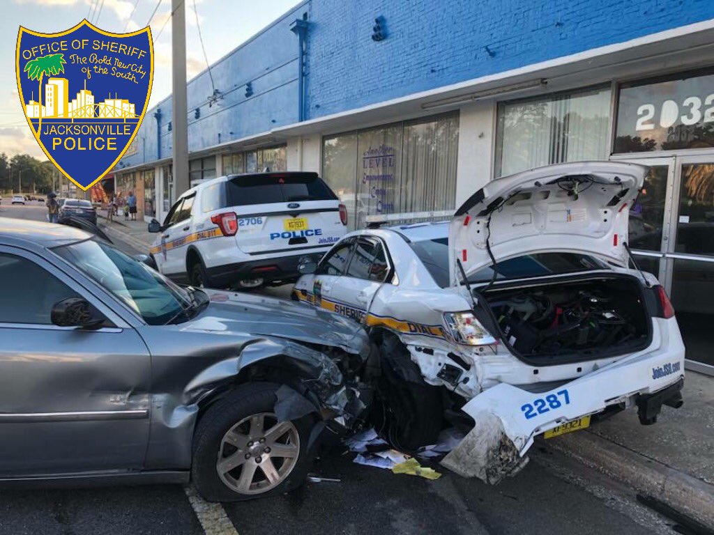 When two police vehicles are parked on the side of Blanding Blvd. and a drunk driver drives right into them.  Fortunately the officers had just got out of their vehicles 30 seconds before the crash occurred. Drunk driver was arrested.   