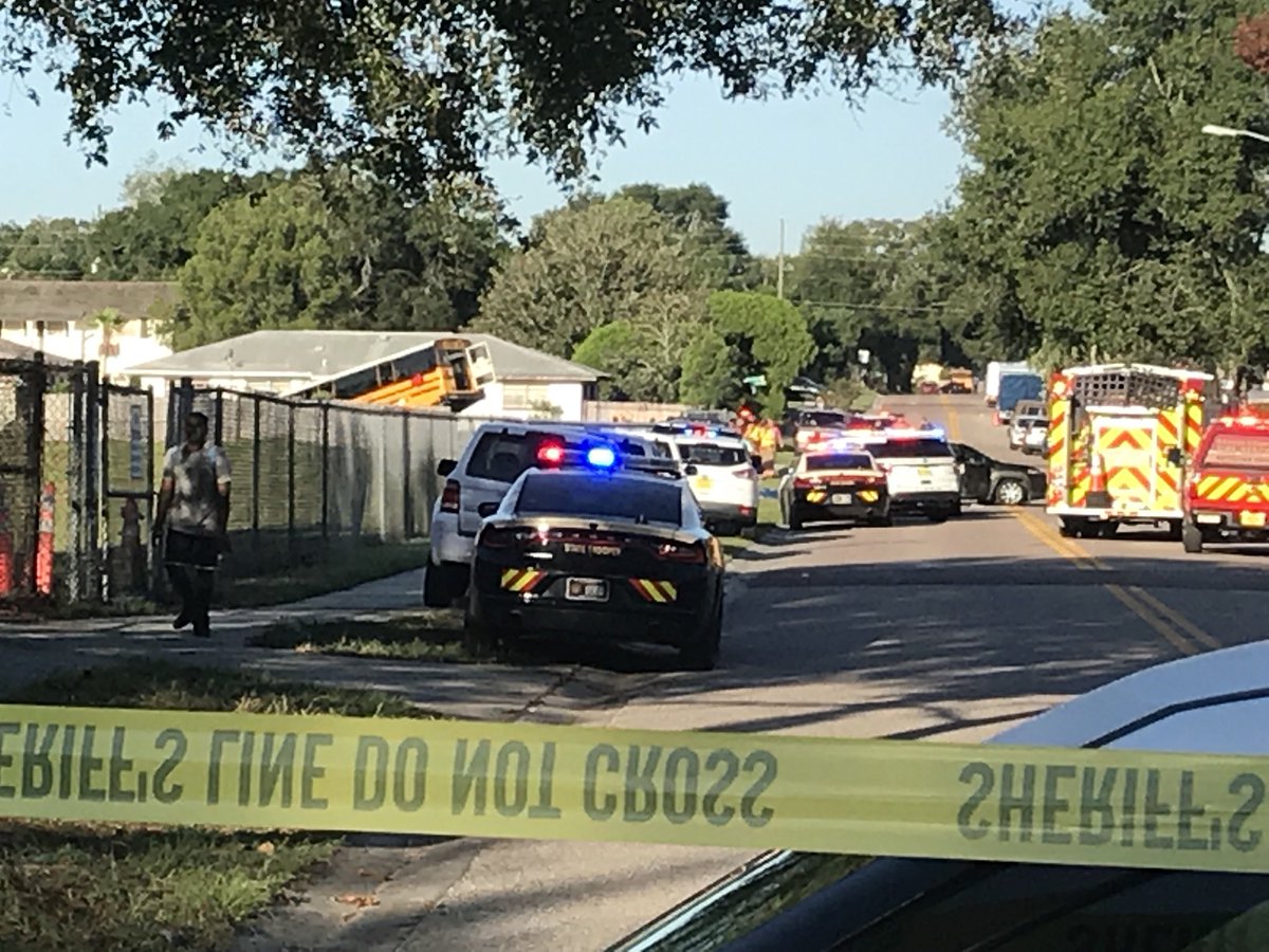 On scene of school bus crash in Orange County. It appears bus drove into a yard. Neighbors say there's a pool in that yard. No word on injuries.