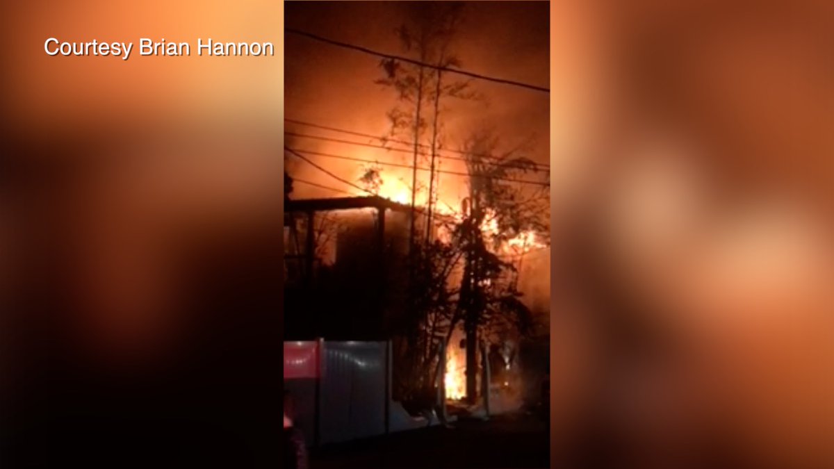 St. Petersburg FD officials say two people jumped for their lives as a fire consumed their apartment. They had to leave behind their dog but were soon reunited. No one was injured