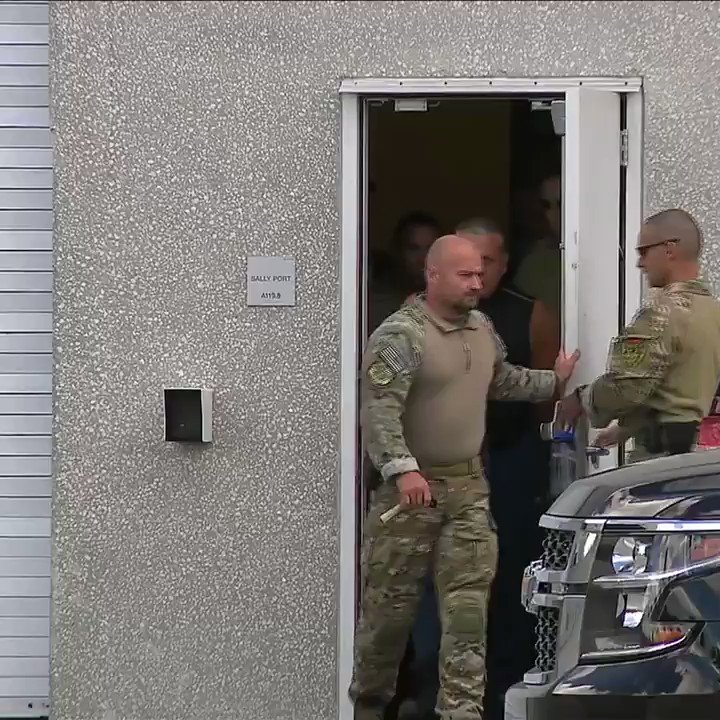 Suspicious package suspect Cesar Sayoc escorted out of FBI headquarters in Miramar, Fla.      