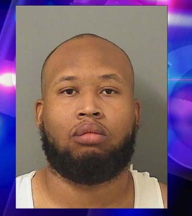 Father charged with child neglect after 7-year-old shot in the arm