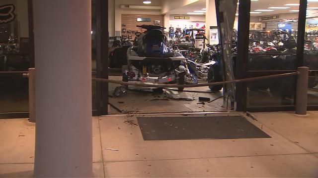 Burglar sought after car smashes into Orlando business, police say
