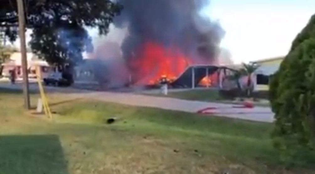 Authorities are investigating what caused a helicopter to crash into a mobile home, killing two and injuring another.    