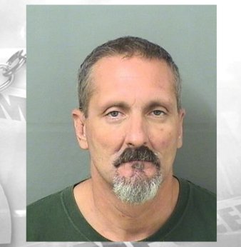 Boynton Beach Police say man sneaked into car, held victim at gunpoint and robbed him     
