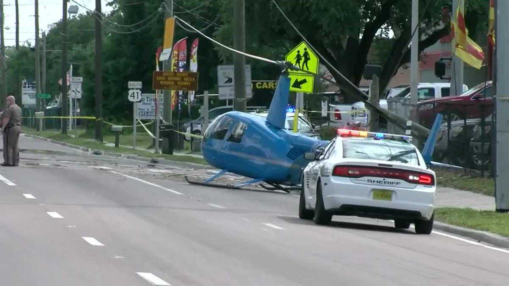 Helicopter crashes onto Florida highway; rotor blade hits truck, killing passenger    