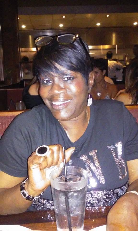 Miami Gardens police are searching for Danette Simmons' killer. Dozens of her friends and family members placed candles and teddy bears the doorstep of her house, where she was gunned down Thursday night in what her granddaughter says was a dispute over a dog.   