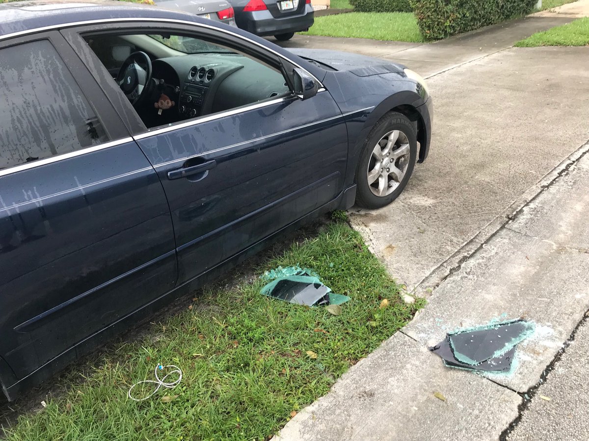 At least 4  cars have smashed windows near scene of homicide investigation in Miami Gardens this morning 
