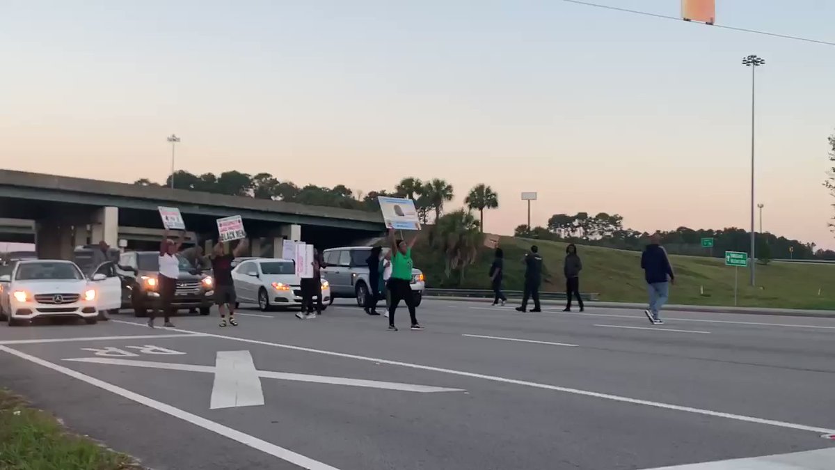 People blocking an intersection in Kingsland over the verdict in the case of Zechariah Presley — former Kingsland police officer who killed Tony Green during a traffic stop. 