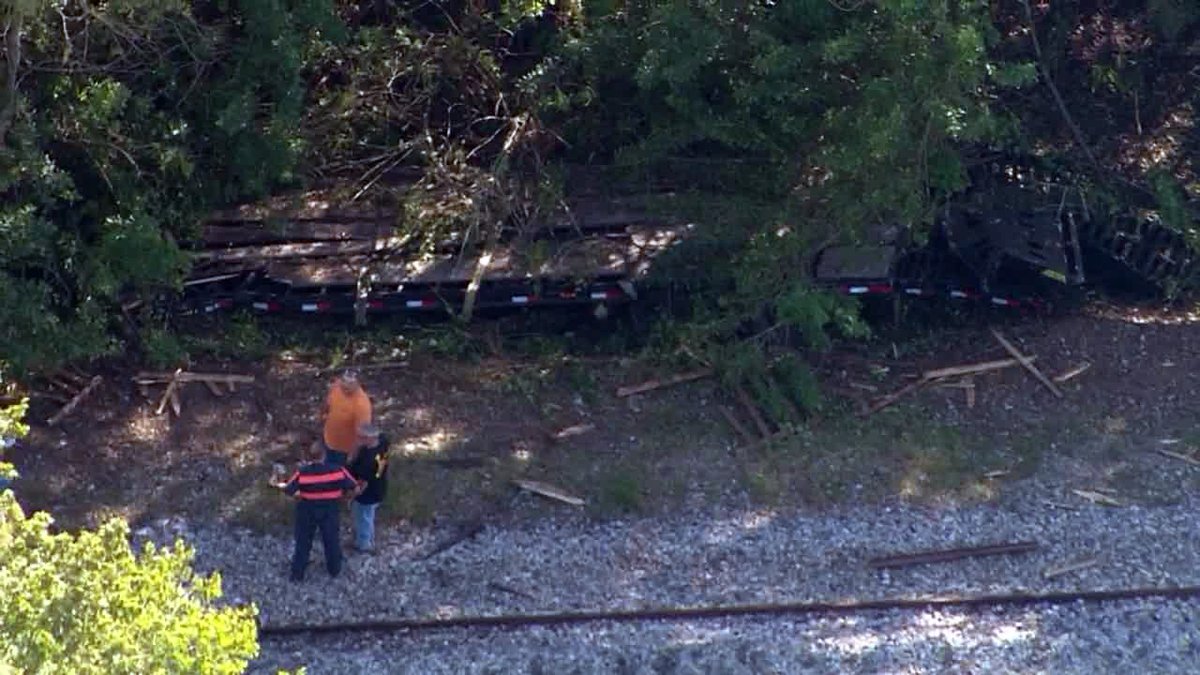 An Amtrak train struck a flatbed trailer that was crossing the tracks in Lakeland this afternoon.