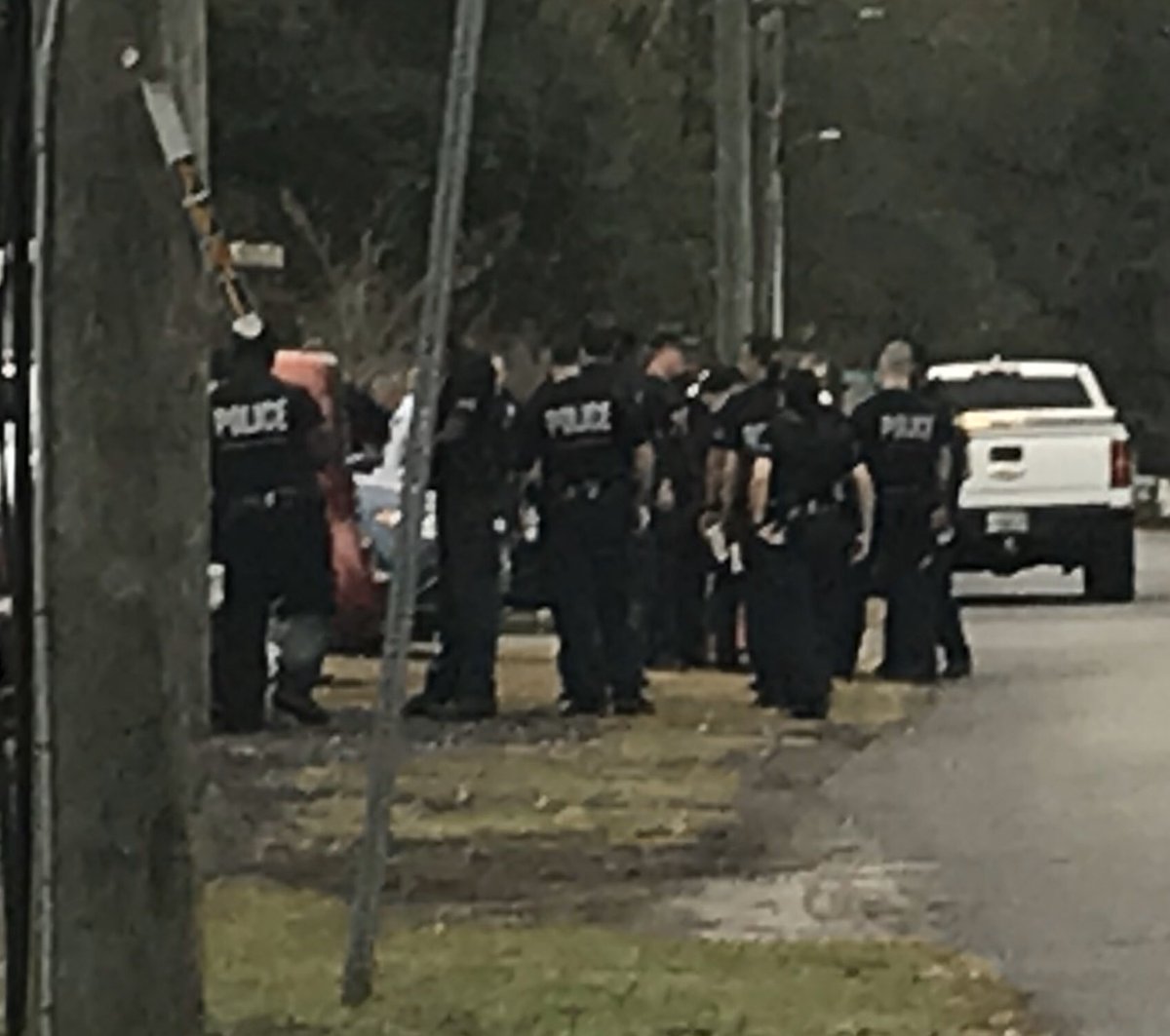 Dozens of officers   on scene waiting to load into busses to begin searching and researching areas throughout the Whitehouse area