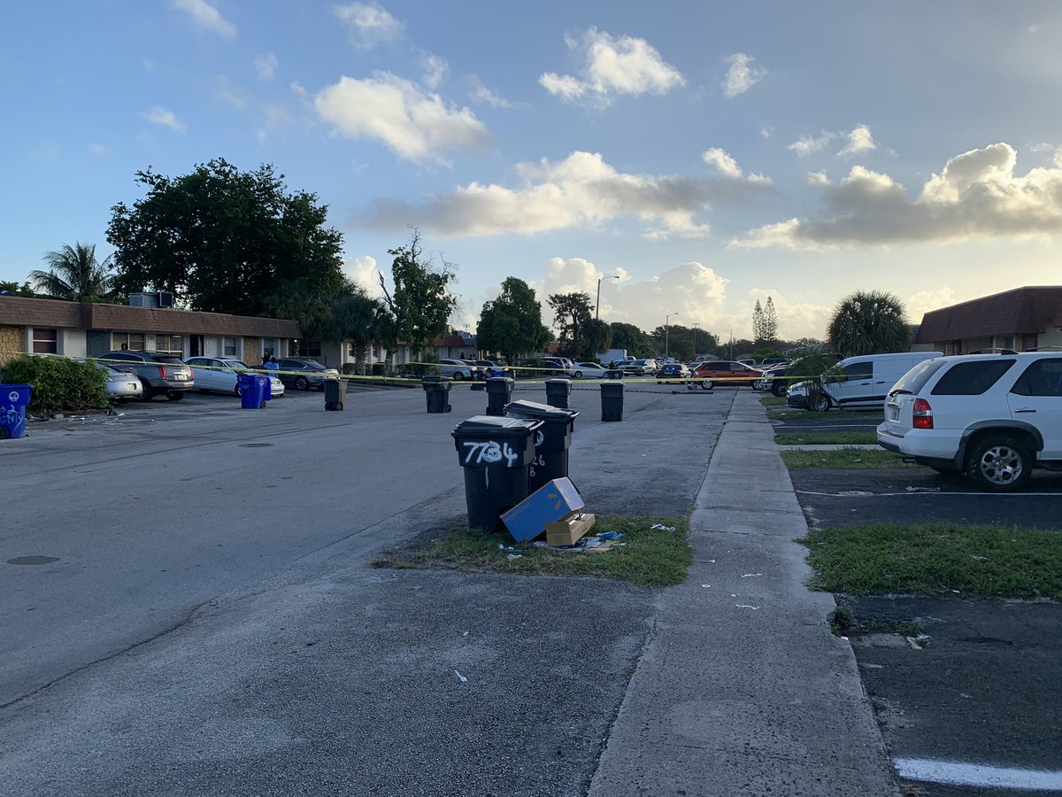 Sheriff investigating possible shooting scene in North Lauderdale. Neighbors say two people were shot. One victim died at the scene. White car   covered with tarp. Second victim taken to @BrowardHealth North