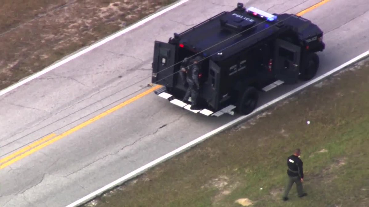 A police officer was shot Thursday near a grocery store in Eustis. The suspect in this shooting remains at large. Law enforcement appears to be searching an area in Lake County.