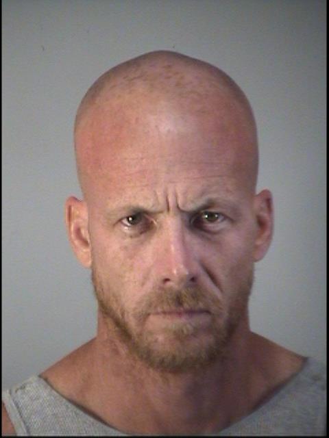 Jayson Colvin, 38, was tracked by several law enforcement officers, including a SWAT team that found him in a wooded area near where he was accused of shooting Eustis police Capt. Gary Winheim.
