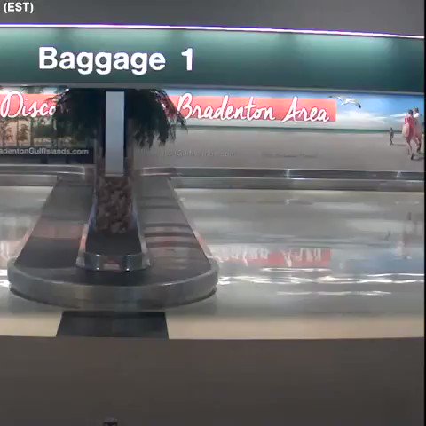 The moment a pickup truck crashes into Sarasota-Bradenton International Airport in Florida; the driver has a history of DUIs and was seriously injured