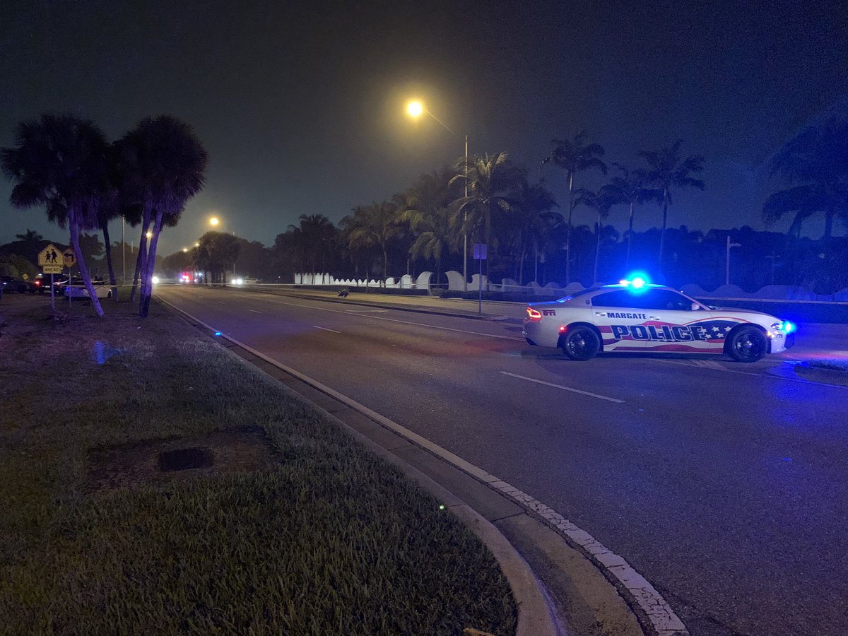 Police working to clear a fatal crash scene along Royal Palm Blvd in Margate. Two people confirmed dead, car parts seen scattered across road. Only one car involved, still unclear what led up to crash