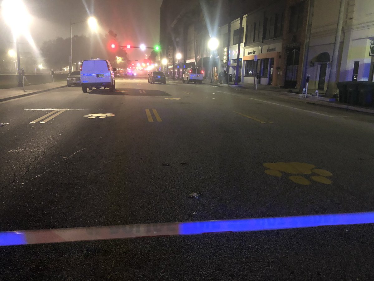 Police on scene for a shooting at a club on E Bay Street. They say one man is dead following a Christmas party at Live Bar 