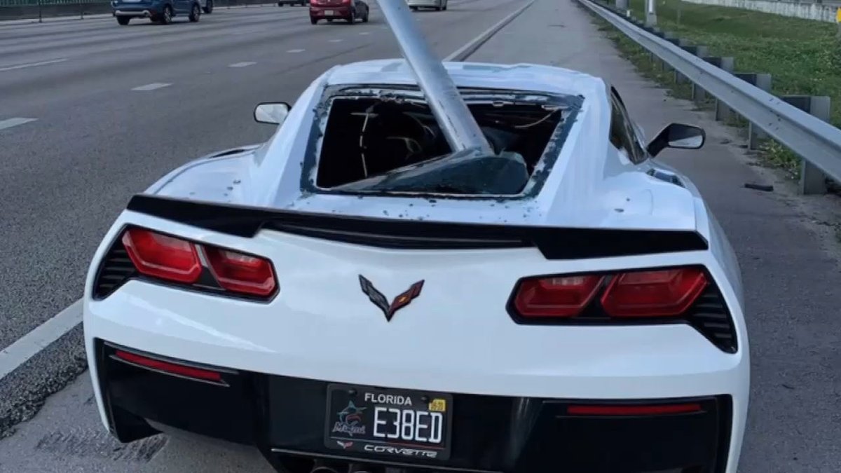 Investigators in South Florida said a road sign ended up lodged in the rear window of a Corvette.