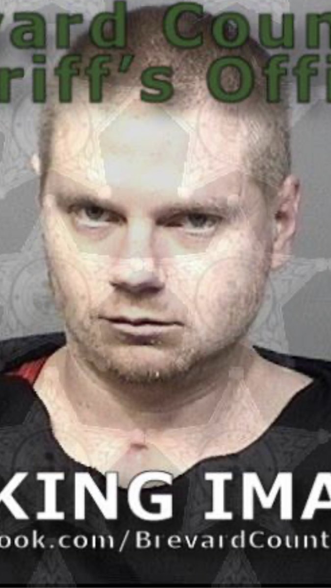 The pair taken into custody id'd as 28 yr old Nicholas McDuffie, 32 yr old Victor Cruz. McDuffie charged with  failing to report a death. Both men charged with  tampering with  evidence. Body found at Leewood home i-d'd as 24 yr old Tyler Moore.