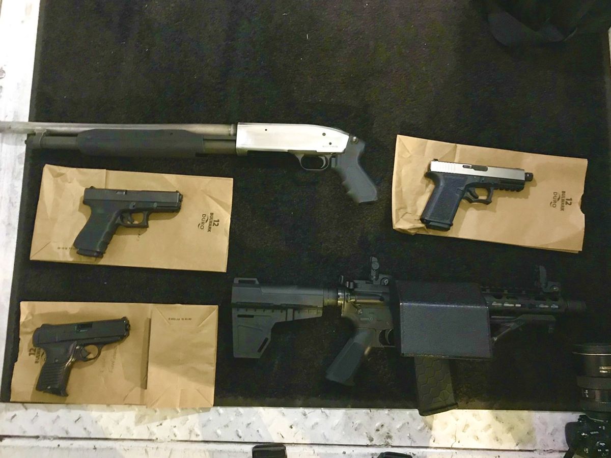 Guns, stolen police vest found inside stolen car at International Drive nightclub, policemen say