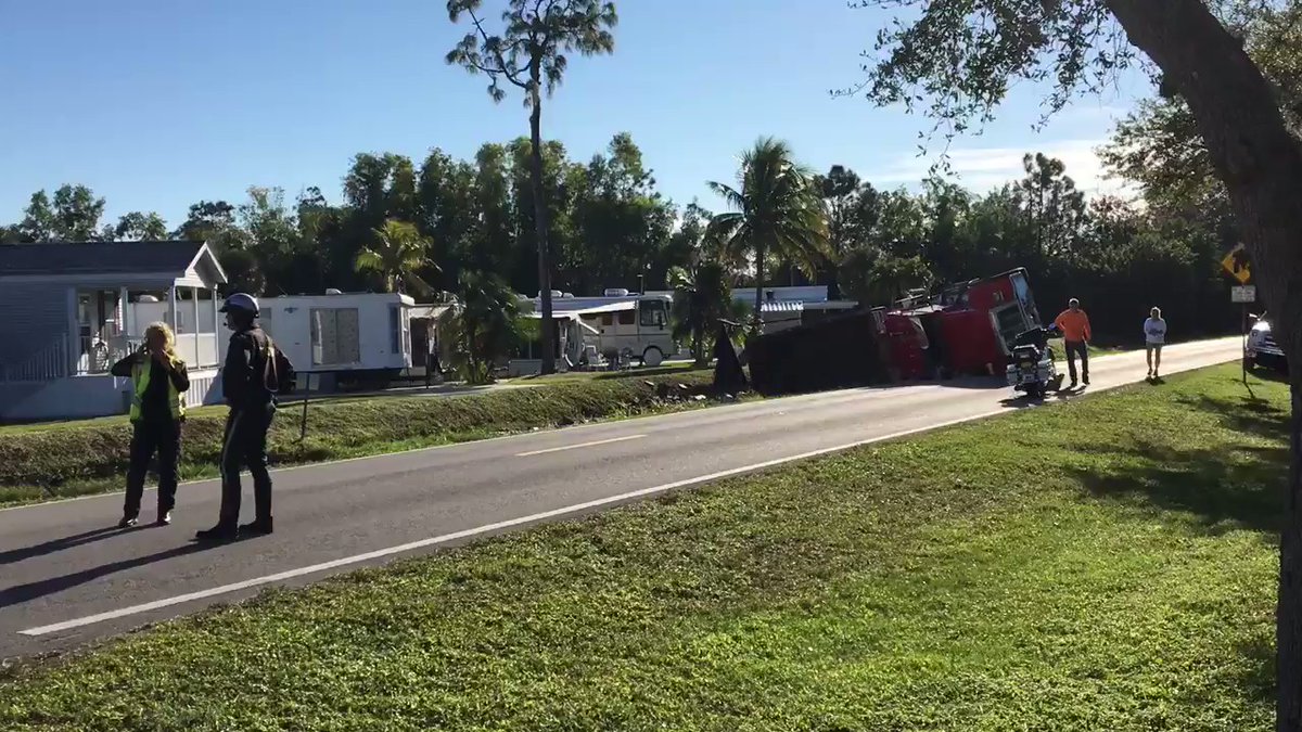 A truck is flipped over on Barefoot Williams Road and Tall Oak Road in Naples. Traffic is being diverted down Price Street. 