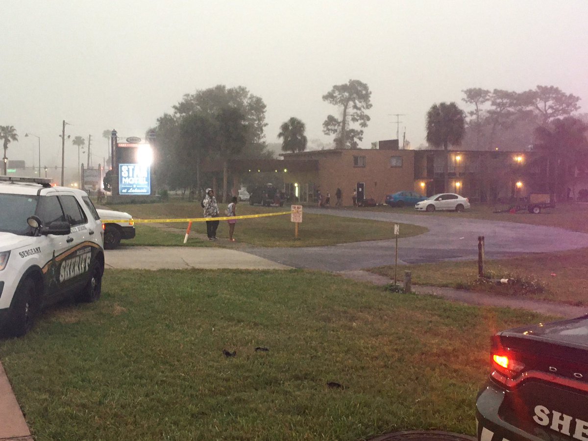 Completely different scene   at the Lake Cecile Inn and Suites as it appears police are making one final push to clear the building. 