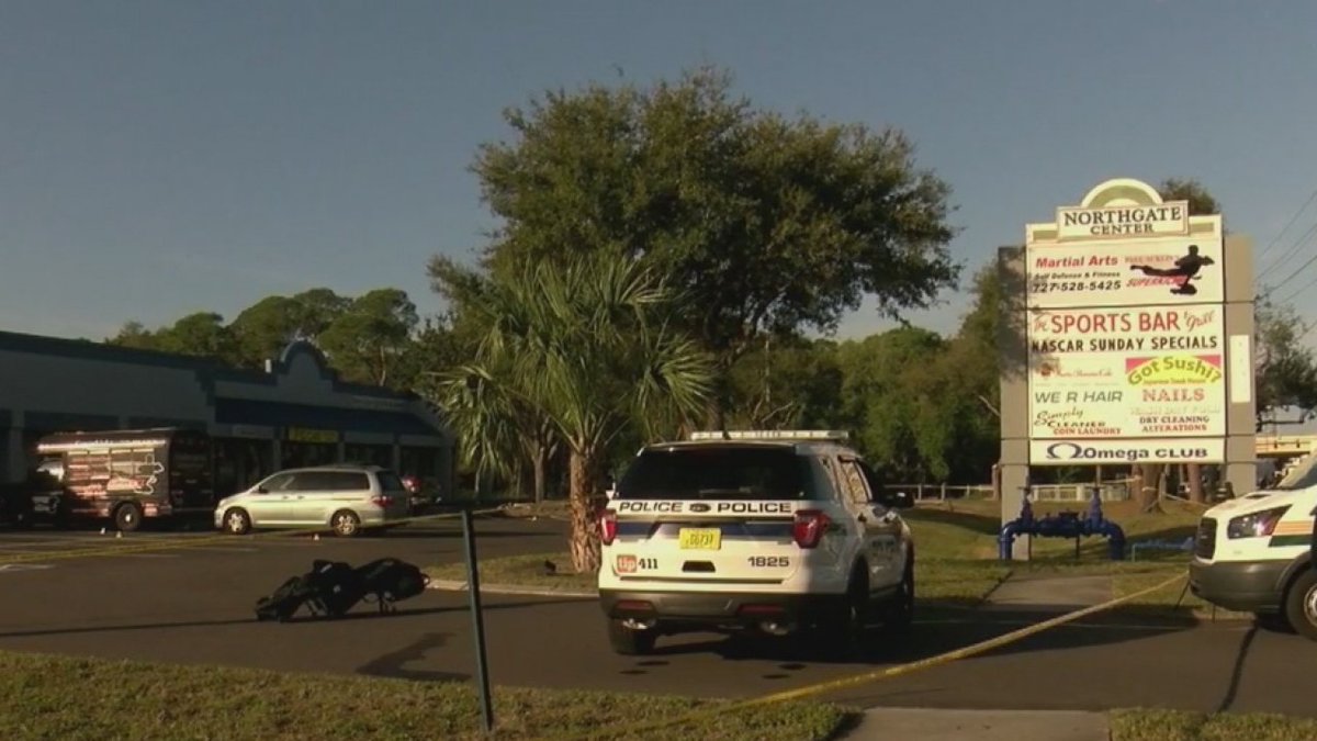Police have opened a death investigation after a man was found dead in a parking lot after attending a sports bar in a nearby shopping plaza.