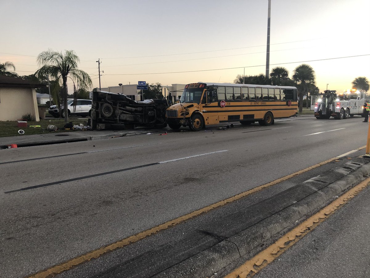 Confirmed from the scene in Lee Blvd near Douglas Ave. Bus 2126 headed to Riverdale. 2 students said their backs hurt - bus vs truck - driver of truck injured  - two lanes are blocked - expect delays - tow truck here