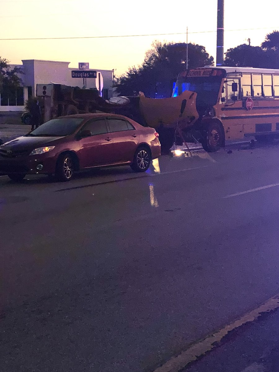 Confirmed from the scene in Lee Blvd near Douglas Ave. Bus 2126 headed to Riverdale. 2 students said their backs hurt - bus vs truck - driver of truck injured  - two lanes are blocked - expect delays - tow truck here