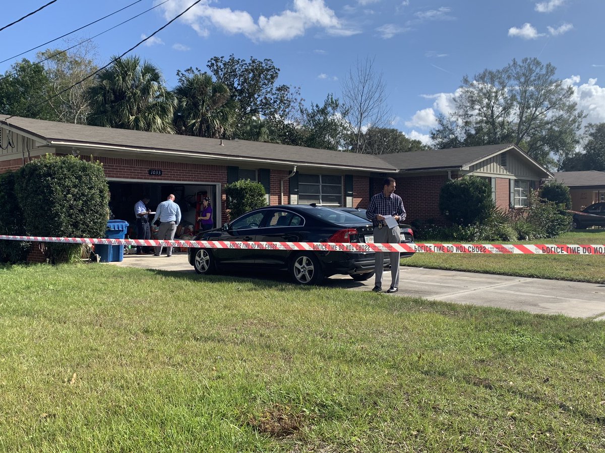 JSO says after the shooting there was Home invasion townsend blvd down the street from where the car was dumped.  Police say the 2 suspects went inside this home, Changed clothes & Held homeowner hostage. Then was picked up in Red/orange dodge challenger. 