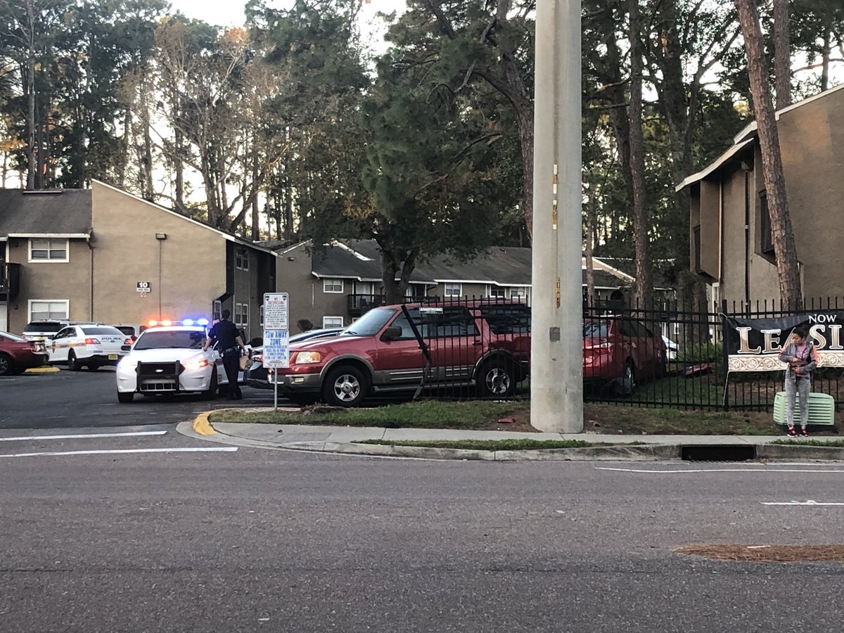 Here's another look at the crash off Powers Avenue not far from Wolfson High School. The red sedan has a lot of damage. Looks like it hit the fence and the red Ford SUV 