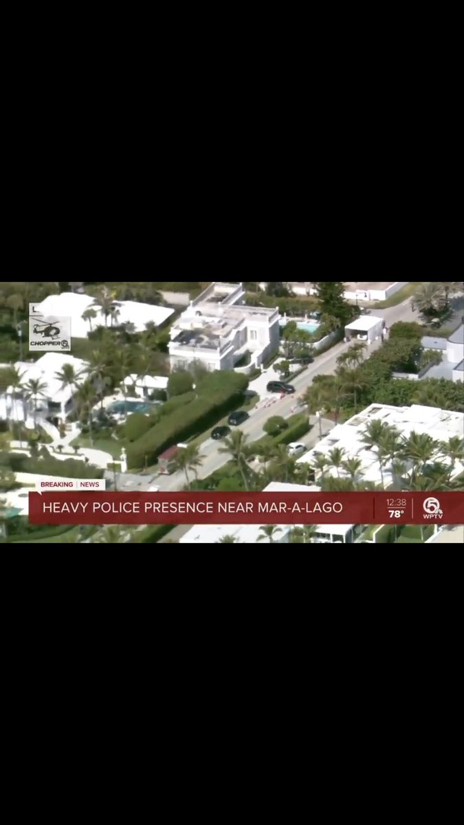 Chopper 5 grabbing aerial views of increased police presence near Mar-a-Lago. Red police tape is present