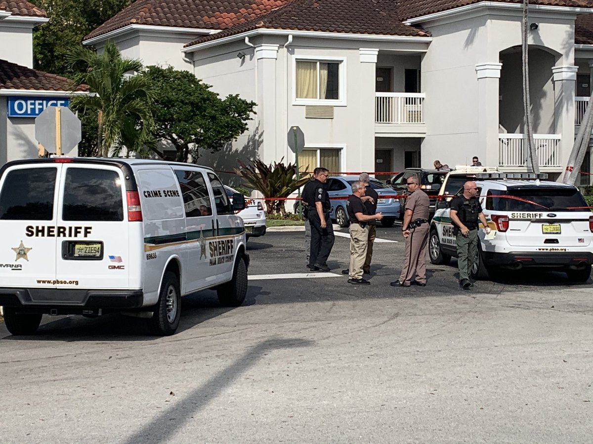 Crews getting ready to tow black SUV from Studio 6 in West Palm Beach