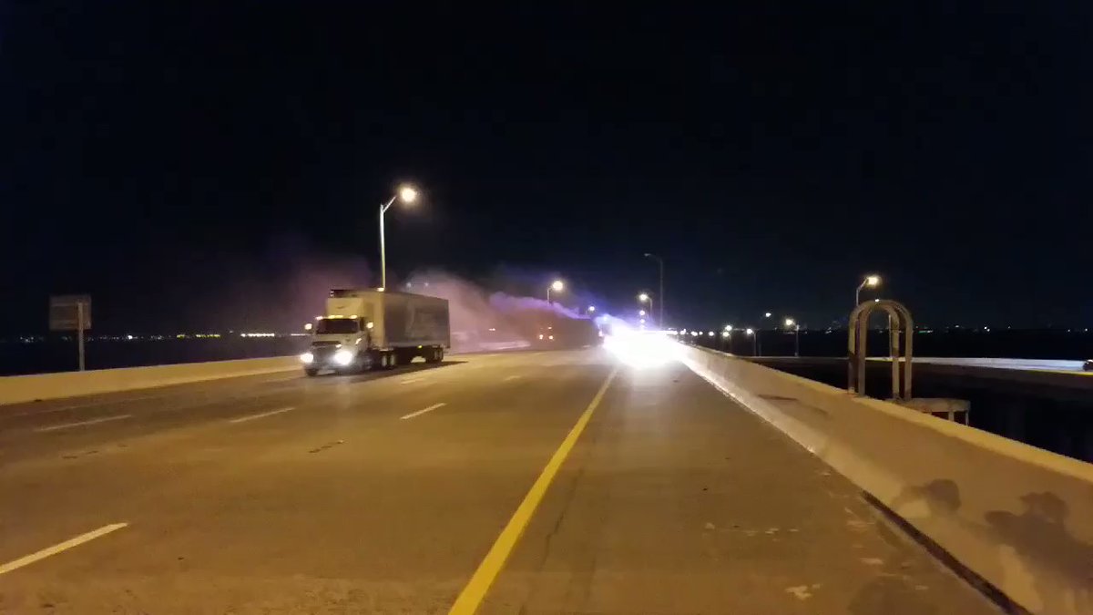 Vehicle fire on the hump of the Howard Franklin. Car ran into the back of a dump truck. Car heavily involved upon arrival. Right lane   open after closure. 