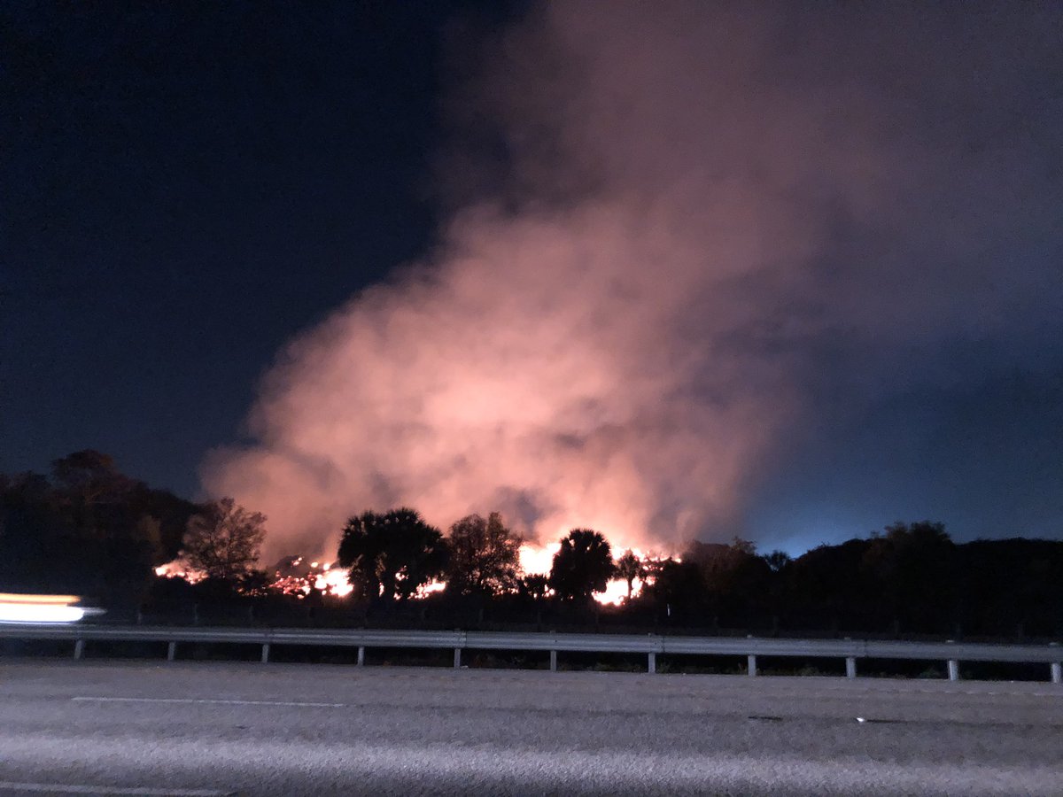 Along I-75 where flames and smoke are close.