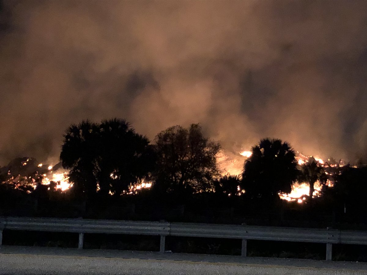 Along I-75 where flames and smoke are close.