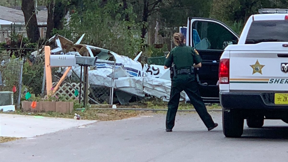Two people are dead after the small plane they were in crashed down into a neighborhood this morning in Polk County. (Photo: Netza Rodriguez)