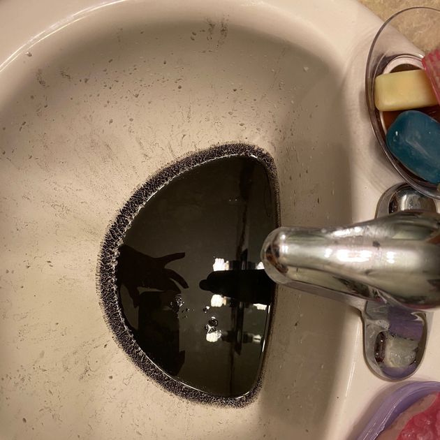 The water pouring out of Renee Bronson’s faucets several days this month has smelled of mold and had a hue resembling dirty motor oil.