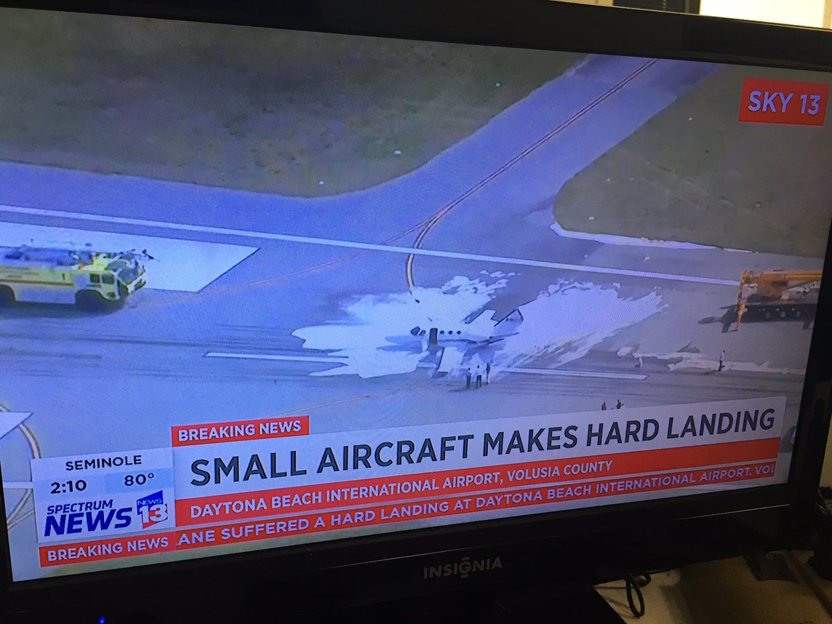 Rescue crews tending to a small plane that made a hard landing on the runway at Daytona Beach Airport.   Two people on board, we're told, are okay.   Sam Harwood shared this video of fire rescue on scene.   