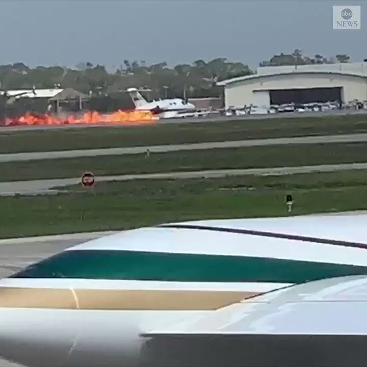 Sparks fly as a small plane scrapes along the runway on its belly at Daytona Beach International Airport.  No injuries were reported in the hard landing and the cause is being investigated