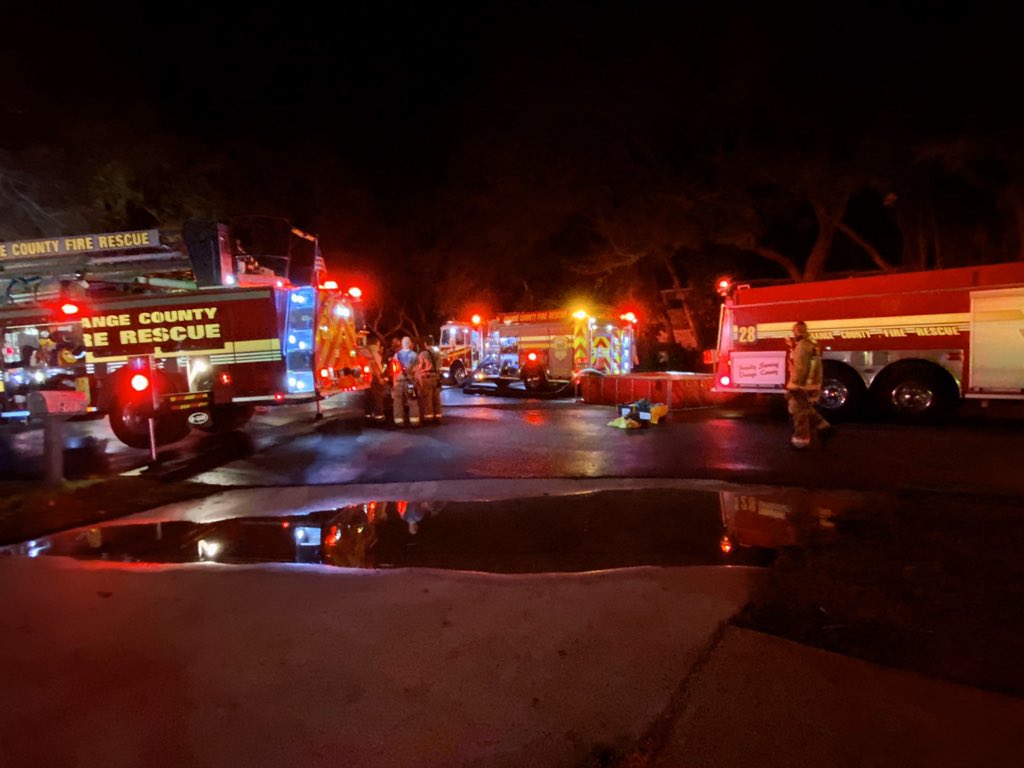 Firefighters arrive to put out a house fire in Apopka, but found no fire hydrant. They had to fill up tanks at a Wawa a mile away. Two adults & 5 dogs are ok. Cause under investigation but started in garage where some hunting ammunition began exploding during blaze 