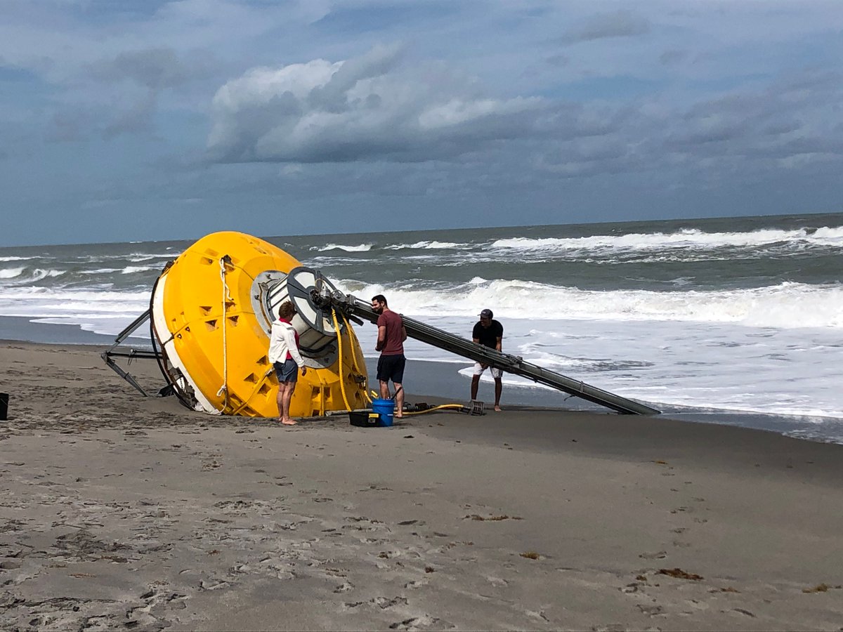 Crews working to remove massive buoy from Hobe Sound beach