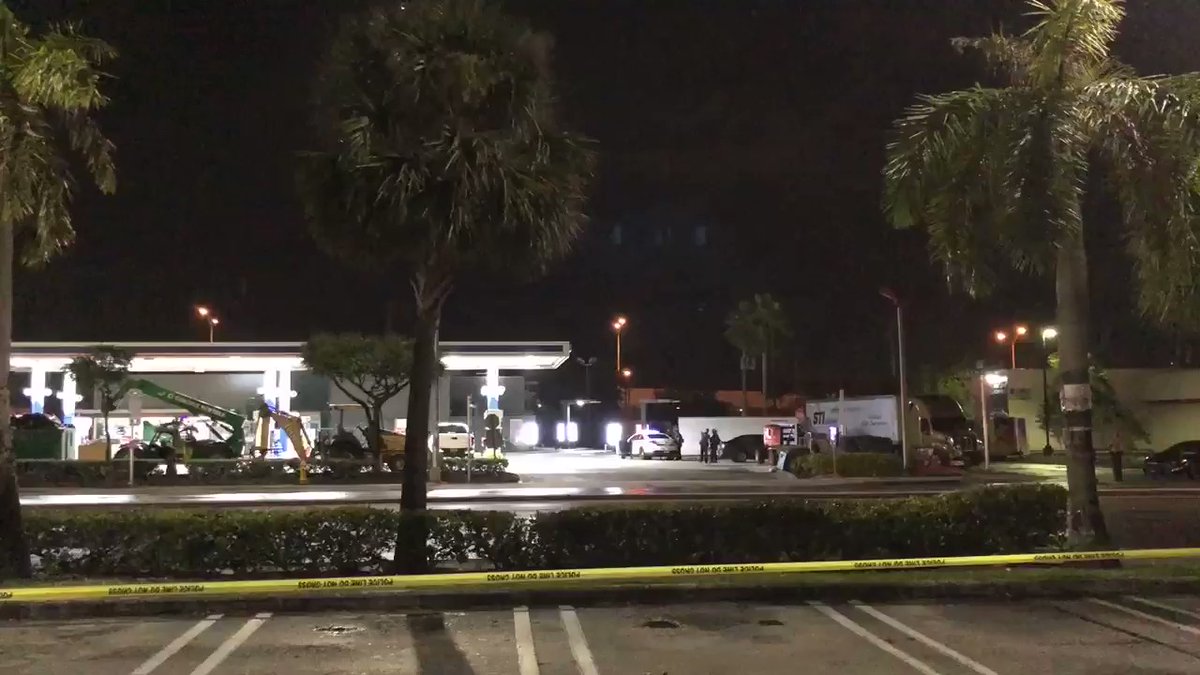 Miami Dade Police surrounding McDonald's at NW 7 Ave and 119 ST. Employees say a man got on the roof and threw a hammer off along with other items. Roads blocked off nearby as negotiators work to get man off roof