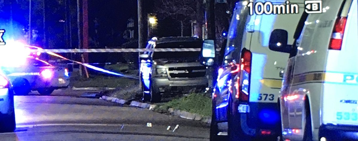 Investigators still on scene in the 1500 blk of W 15th st after 1 man was killed and 1 other wounded in an overnight shooting- evidence markers in the road where the man was found 