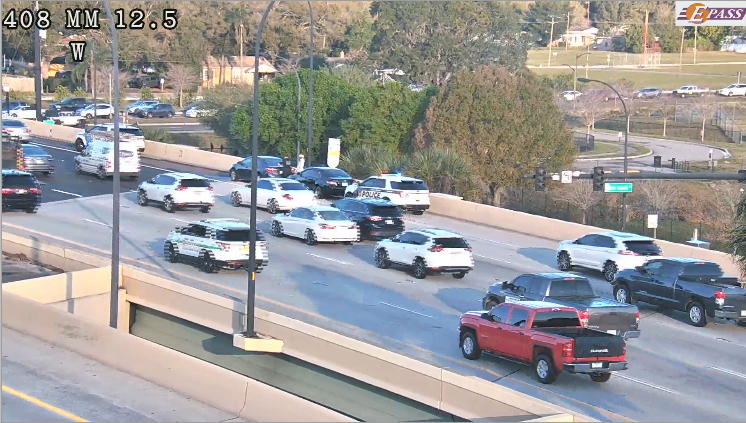 CRASH blocking right shoulder of SR-408 west near Crystal Lake Dr. Orlando 