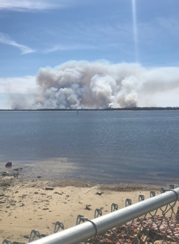 The smoke near Shell Island Officials say it is a controlled burn