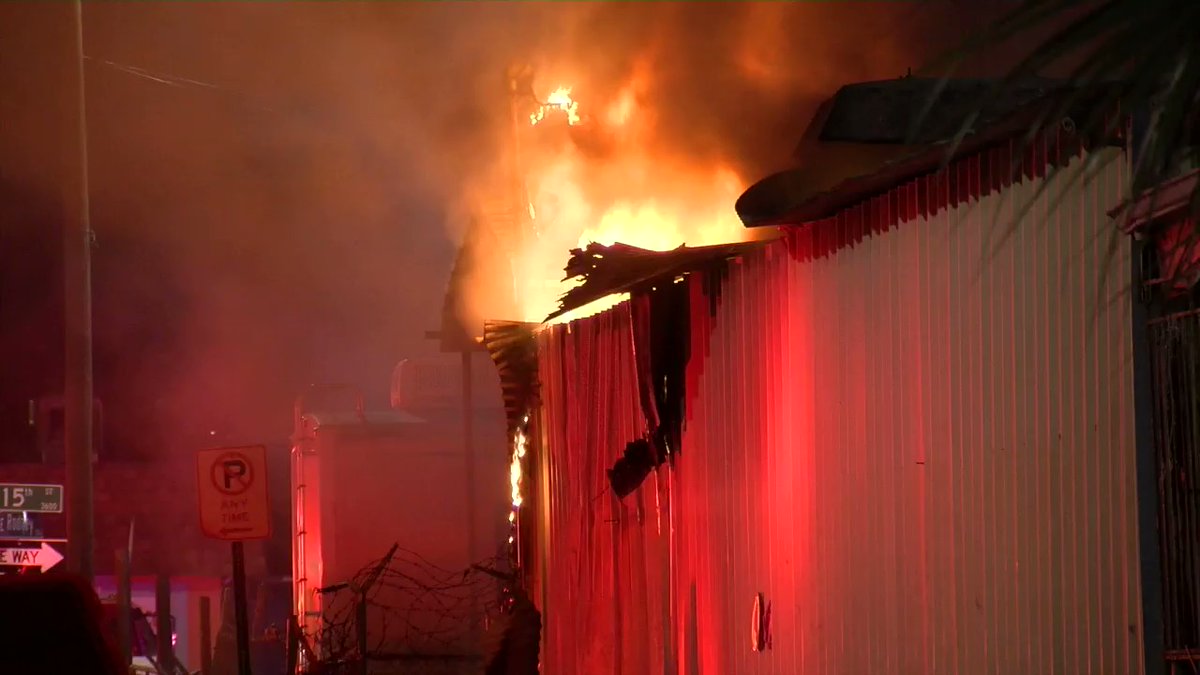Tampa Fire Rescue firefighters are working a second alarm building fire at Lake Ave and 15th Street