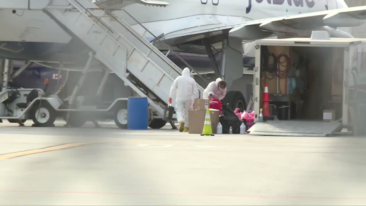 HAZMAT teams continue working a JetBlue plane at @flyPBI that has a coronavirus patient on board. 