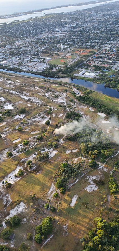 Fire West Palm Beach golf course small building On fire middle of the golf course