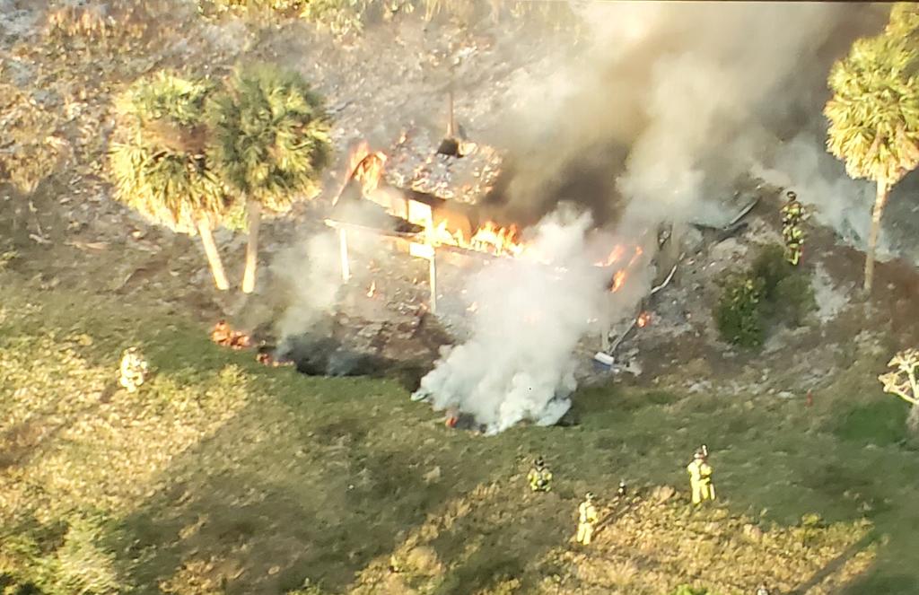 Fire West Palm Beach golf course small building On fire middle of the golf course