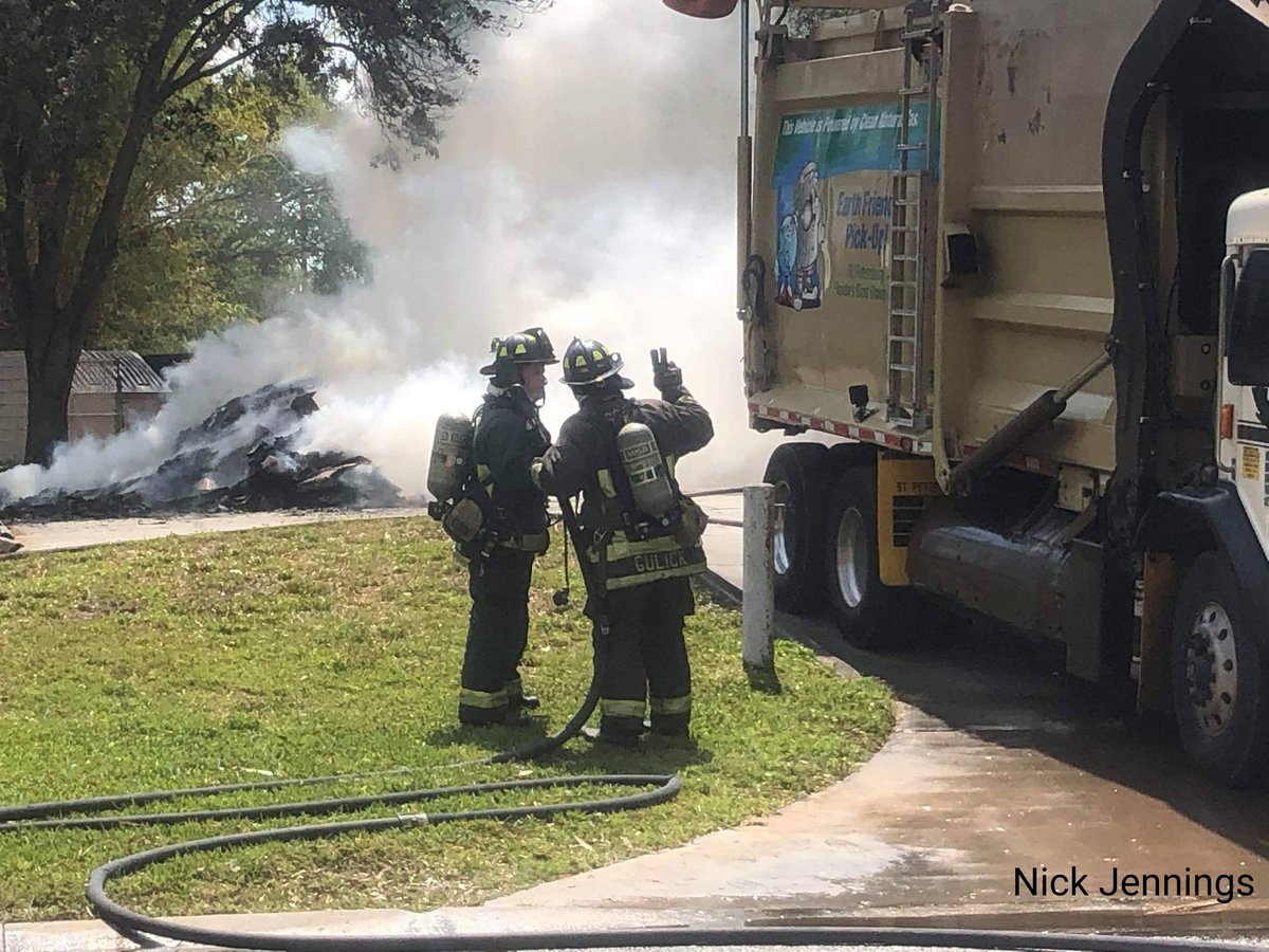 St. Petersburg: Garbage truck and contents on fire at 49 Avenue N and 4th Street N